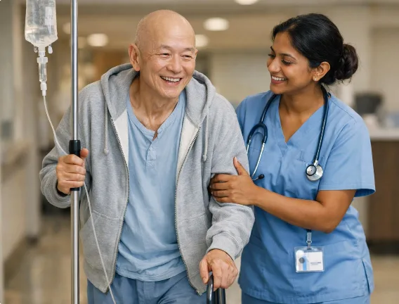 Nurse supporting an older patient with an IV stand